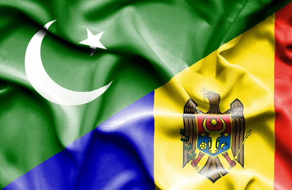 Waving flag of Moldavia and Pakistan — Stock Photo, Image