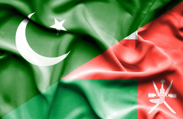 阿曼和巴基斯坦那飘扬的旗帜 — 图库照片