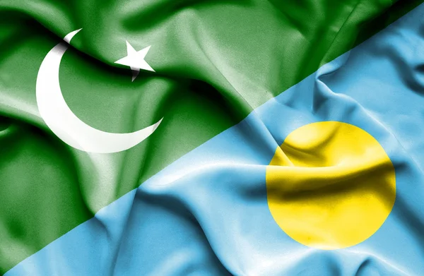 Waving flag of Palau and Pakistan — Stock Photo, Image