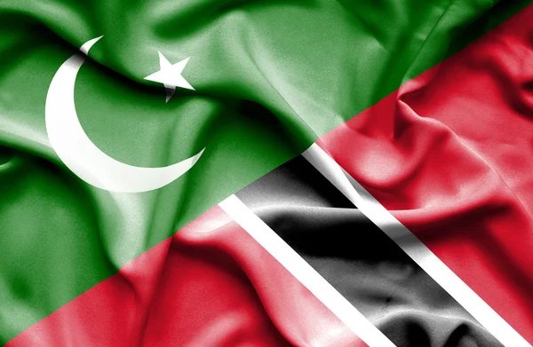 Waving flag of Trinidad and Tobago and Pakistan — Stock Photo, Image