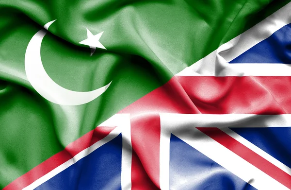 Waving flag of United Kingdon and Pakistan — Stock Photo, Image