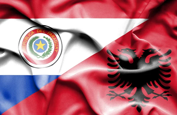 Waving flag of Albania and Paraguay — Stock Photo, Image