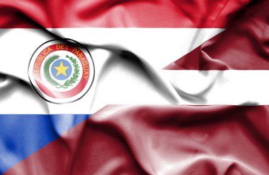 Letonya ve paraguay Cumhuriyeti bayrağı sallayarak
