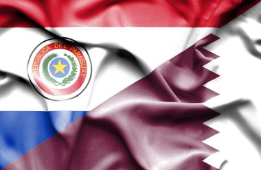 Katar ve paraguay Cumhuriyeti bayrağı sallayarak