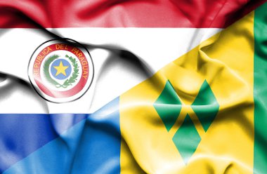 saint vincent ve Grenadinler ve paraguay Cumhuriyeti bayrağı sallayarak
