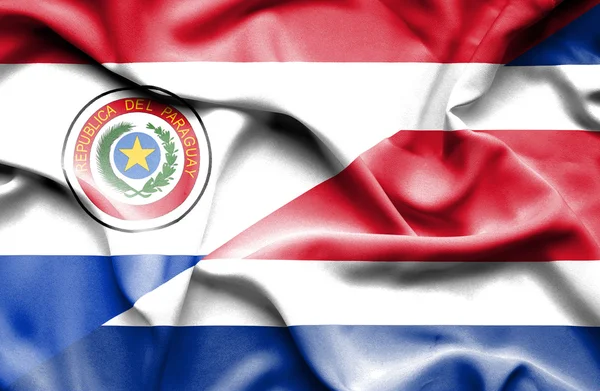 Waving flag of Costa Rica and Paraguay — Stock Photo, Image