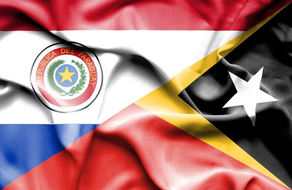 东帝汶和巴拉圭那飘扬的旗帜 — 图库照片
