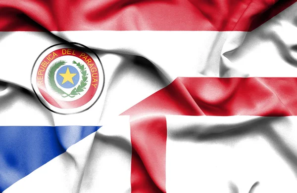 英格兰和巴拉圭的那飘扬的旗帜 — 图库照片