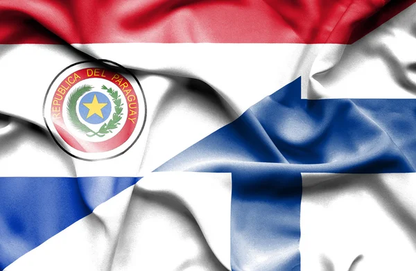 Bandera ondeante de Finlandia y Paraguay —  Fotos de Stock