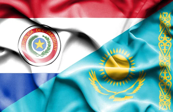 Waving flag of Kazakhstan and Paraguay — Stock Photo, Image