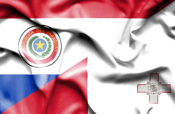 Bandera ondeante de Malta y Paraguay — Foto de Stock