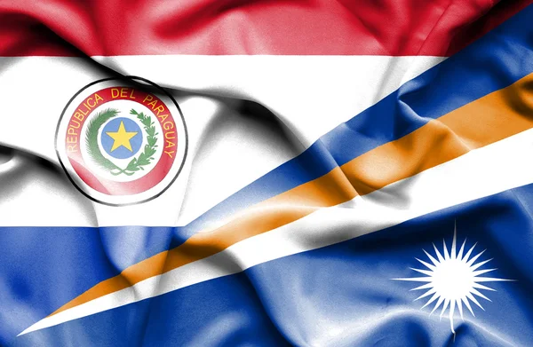 Wapperende vlag van Marshalleilanden en paraguay — Stockfoto