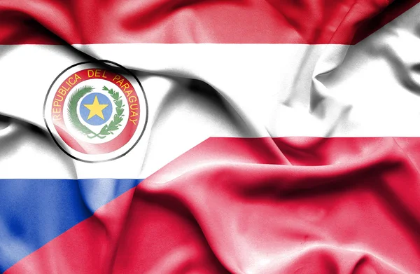Waving flag of Poland and Paraguay — Stock Photo, Image