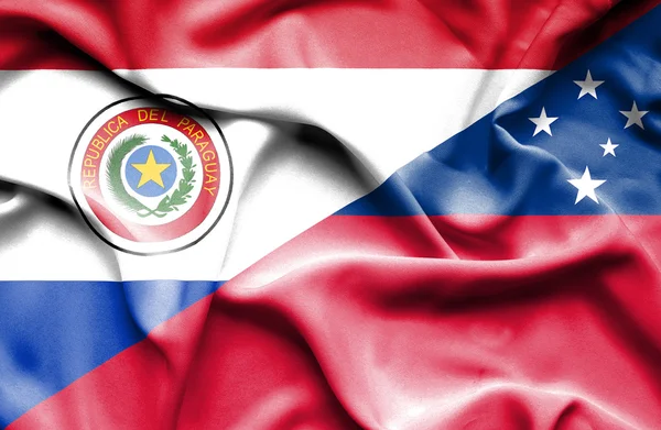 Flagge von Samoa und Paraguay schwenken — Stockfoto