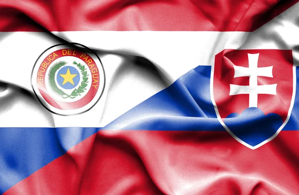 Waving flag of Slovakia and Paraguay — Stock Photo, Image
