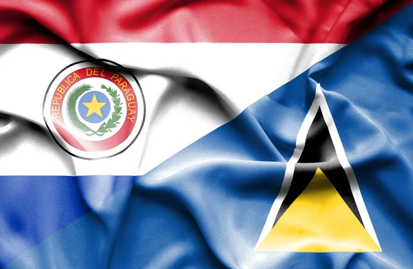 Wapperende vlag van st lucia en paraguay — Stockfoto