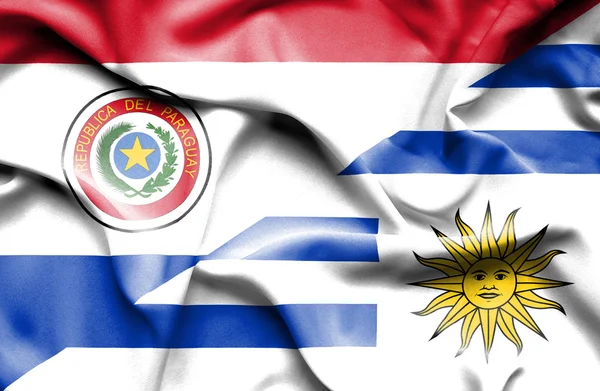 Wapperende vlag van uruguay en paraguay — Stockfoto