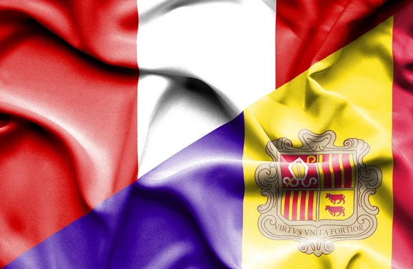 Flagge von andorra und peru schwenkend — Stockfoto