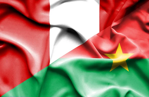 Bandiera sventolante del Burkina Faso e Perù — Foto Stock