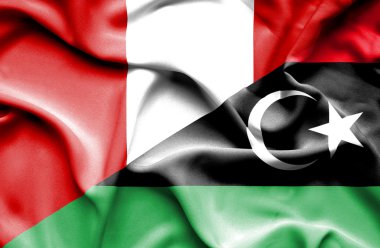 Waving flag of Libya and Peru