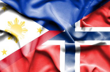 Norveç ve Filipinler bayrağı sallayarak