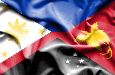 papua Yeni Gine ve Filipinler bayrağı sallayarak