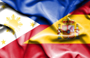 İspanya ve Filipinler bayrağı sallayarak