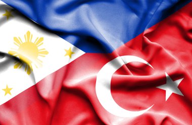 Türkiye ve Filipinler bayrağı sallayarak