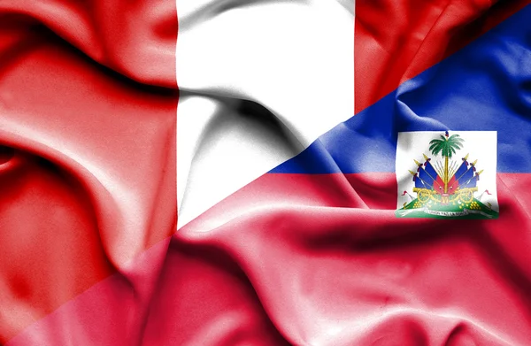 ハイチ、ペルーの旗を振っています。 — ストック写真