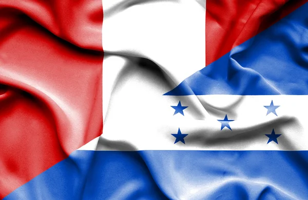 Waving flag of Honduras and Peru — Stock Photo, Image