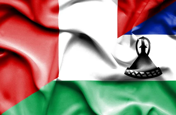 Waving flag of Lesotho and Peru — Stock Photo, Image