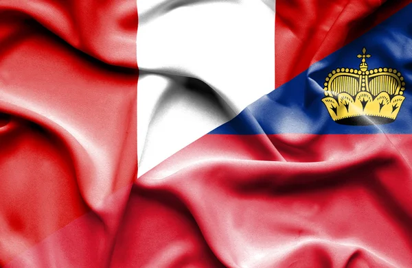 Waving flag of Lichtenstein and Peru — Stock Photo, Image