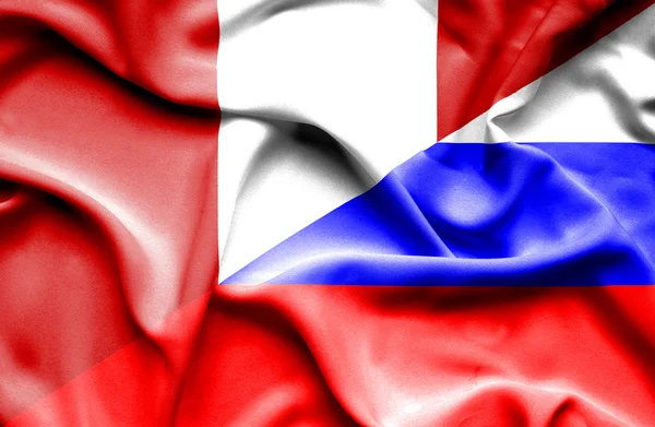 ロシア、ペルーの旗を振っています。 — ストック写真