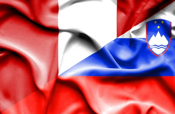 Szlovénia és peru hullámzó zászlaja — Stock Fotó