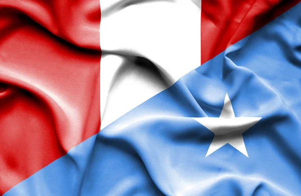 Wapperende vlag van Somalië en peru — Stockfoto