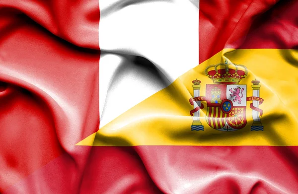 Bandera ondeante de España y Perú — Foto de Stock