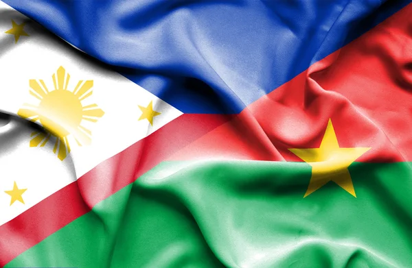 Bandeira acenando de Burkina Faso e Filipinas — Fotografia de Stock