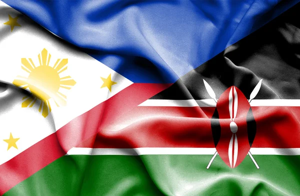 ケニア、フィリピンの旗を振っています。 — ストック写真