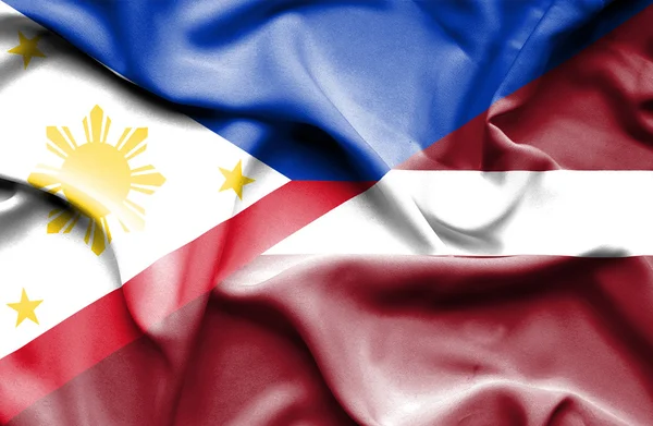Machać flaga Łotwy i Filipiny — Zdjęcie stockowe