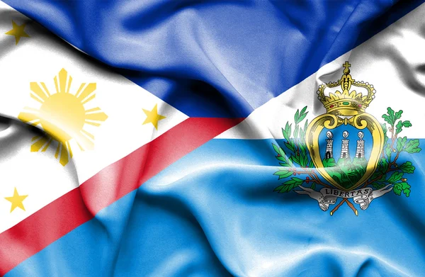 Κουνώντας τη σημαία του Αγίου Μαρίνου και Φιλιππίνες — Φωτογραφία Αρχείου