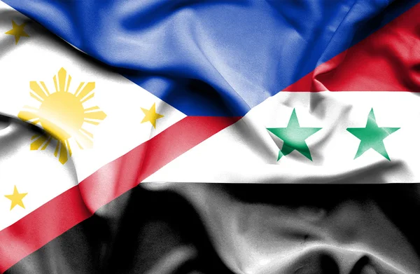 Syrien och Filippinerna viftande flagga — Stockfoto