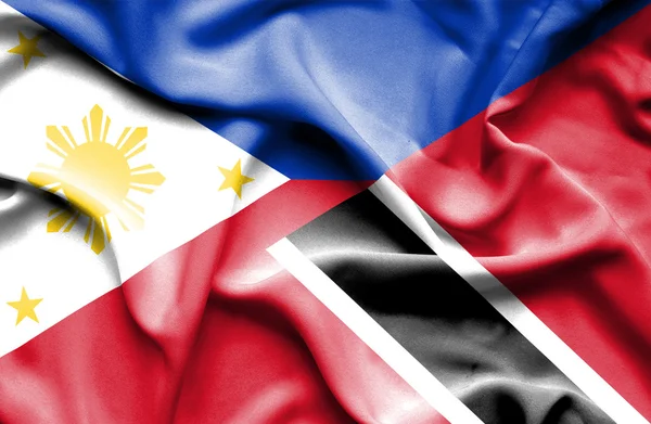 Wapperende vlag van trinidad en tobago en Filippijnen — Stockfoto