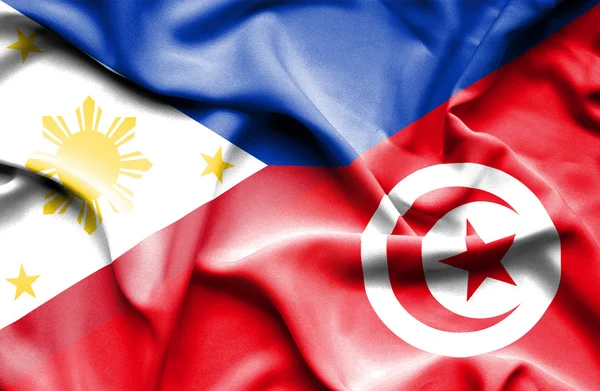 チュニジア ・ フィリピンの旗を振っています。 — ストック写真