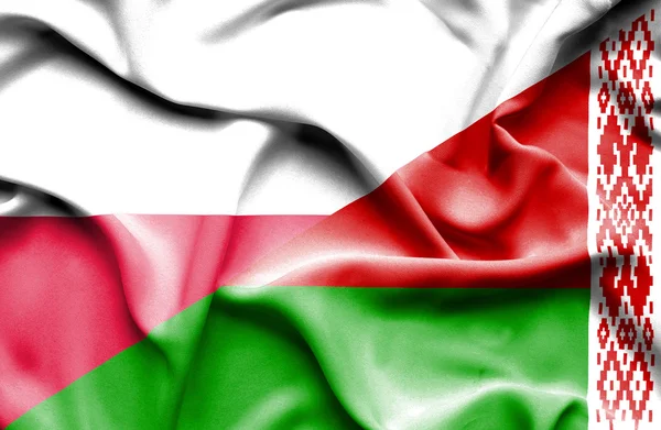 Waving flag of Belarus and Poland — Stock Photo, Image