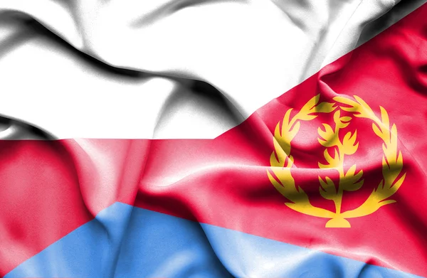 Розмахуючи прапором Еритреї та Польщі — стокове фото