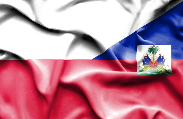 Machać flaga haiti i Polska — Zdjęcie stockowe