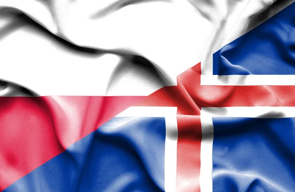 Розмахуючи прапором Ісландії та Польщі — стокове фото