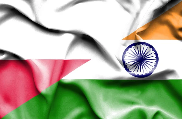 Macha flagą Indii i Polski — Zdjęcie stockowe
