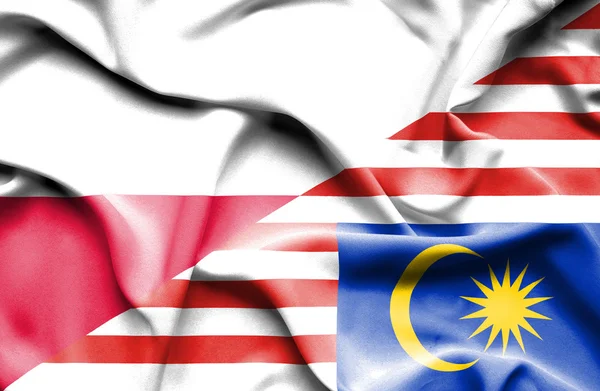 Malaysia och Polen viftande flagga — Stockfoto