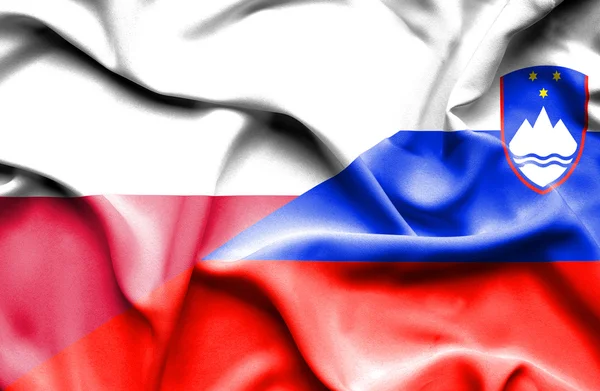 Waving flag of Slovenia and Poland — Stock Photo, Image